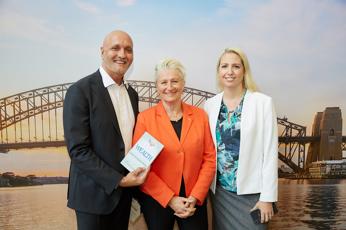 Peter Diaz, Emi Golding and Kerryn Phelps with Mental Wealth book