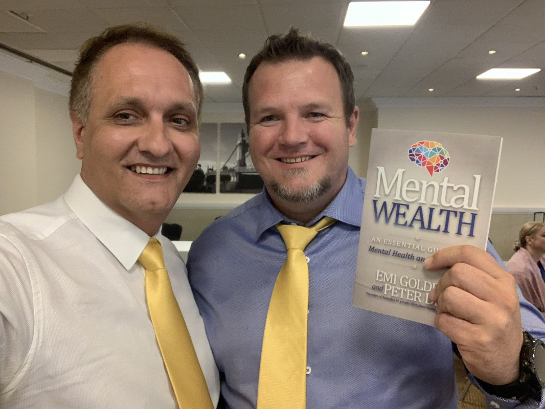 Peter Diaz and Johan Van Niekerk with Mental Wealth Book