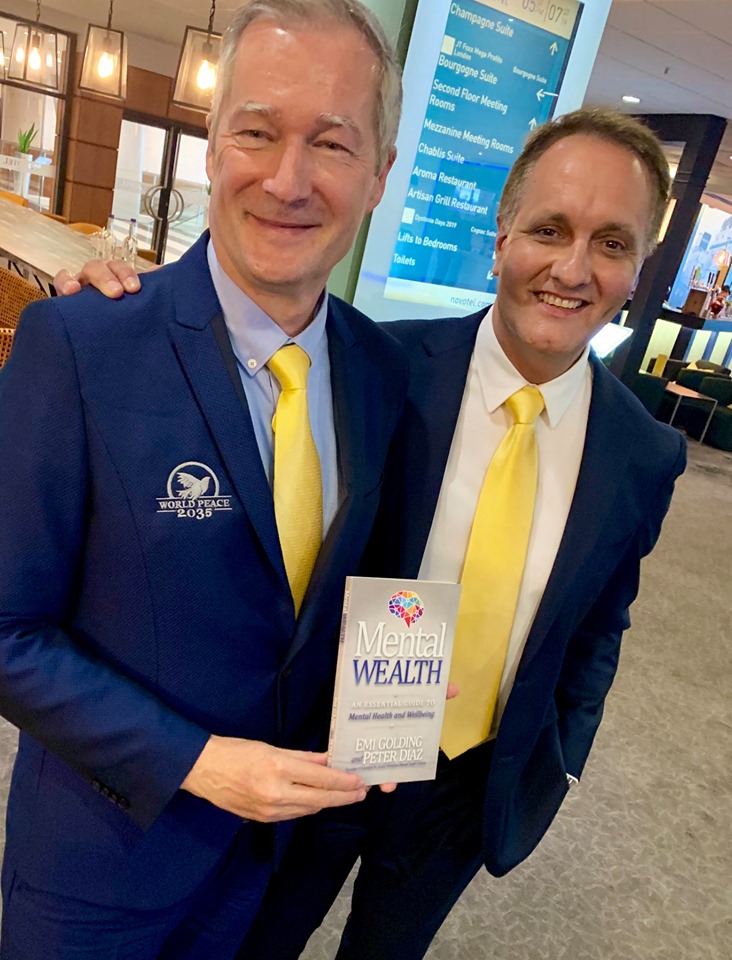 Peter Diaz with Gert Olefs with the Mental Wealth book