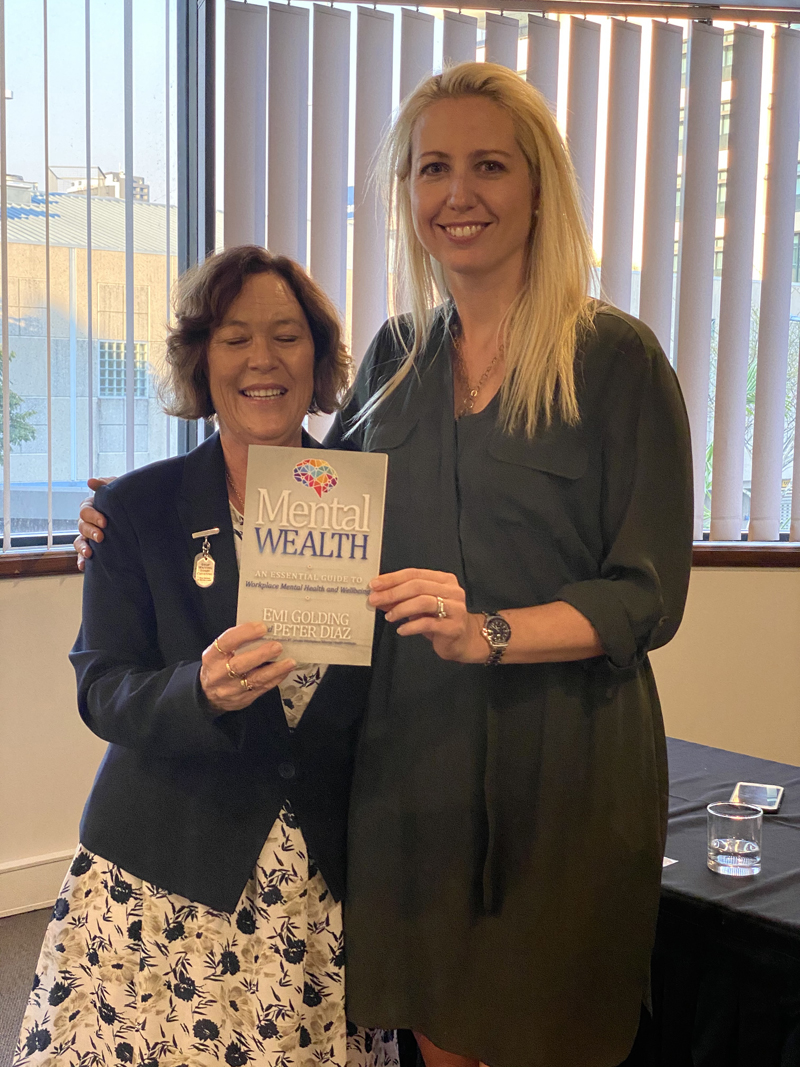 Wendy Marquenie with the Mental Wealth book